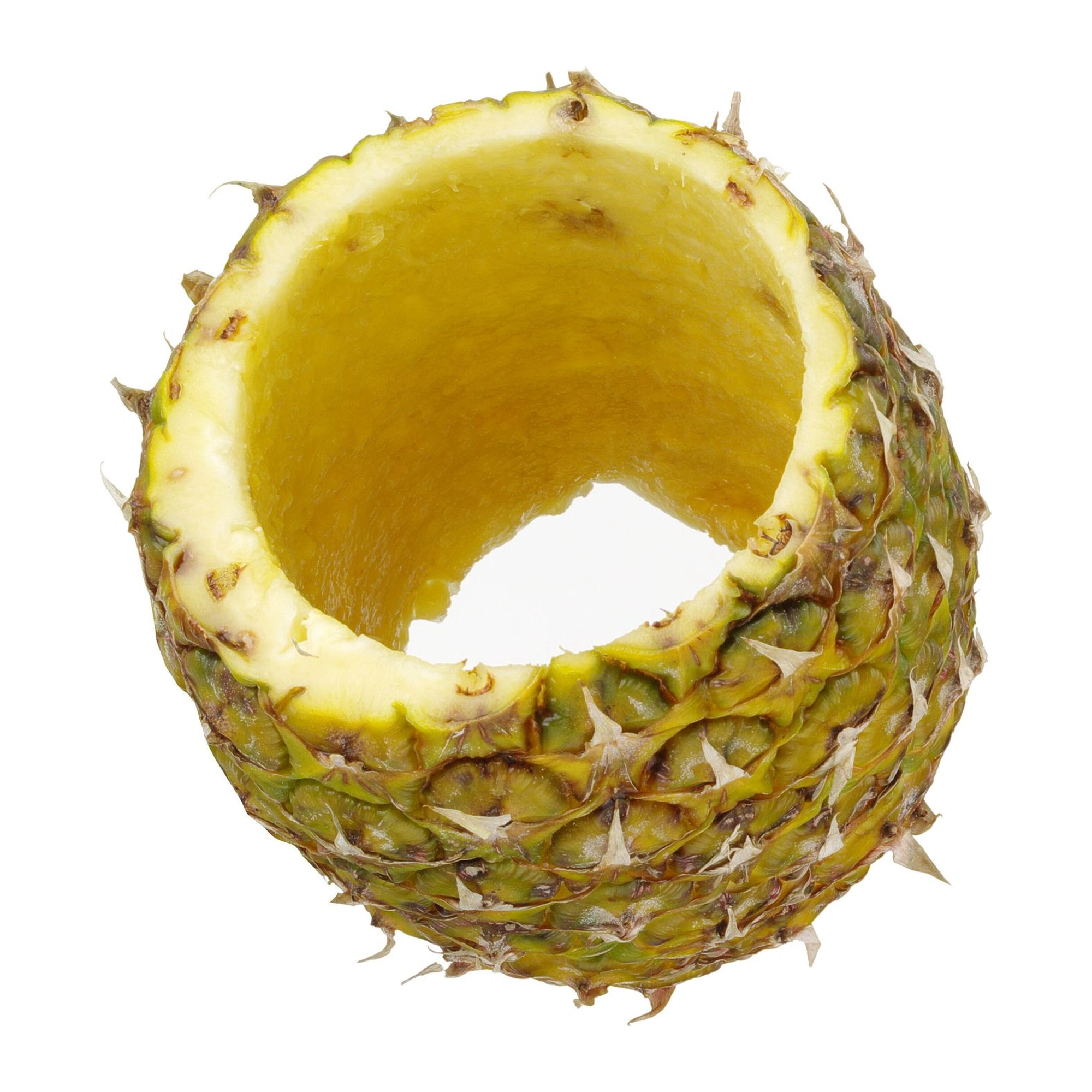 coupe ananas : l'écorce vide de l'ananas, entière, prête à remplir