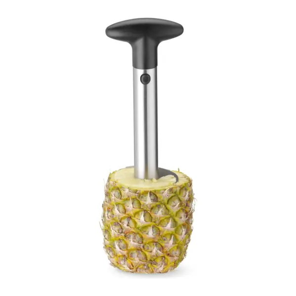 coupe ananas : vissé dans le fruit, l'écorce autour