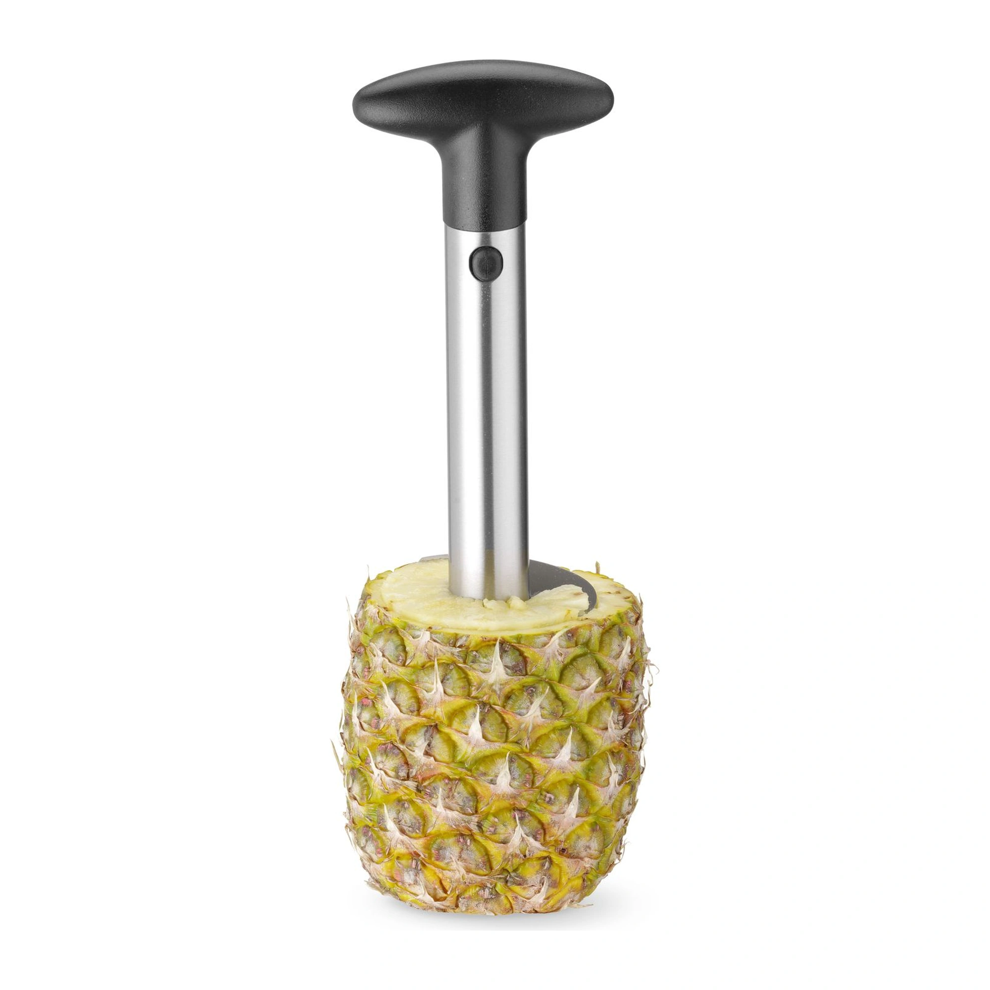 coupe ananas : vissé dans le fruit, l'écorce autour